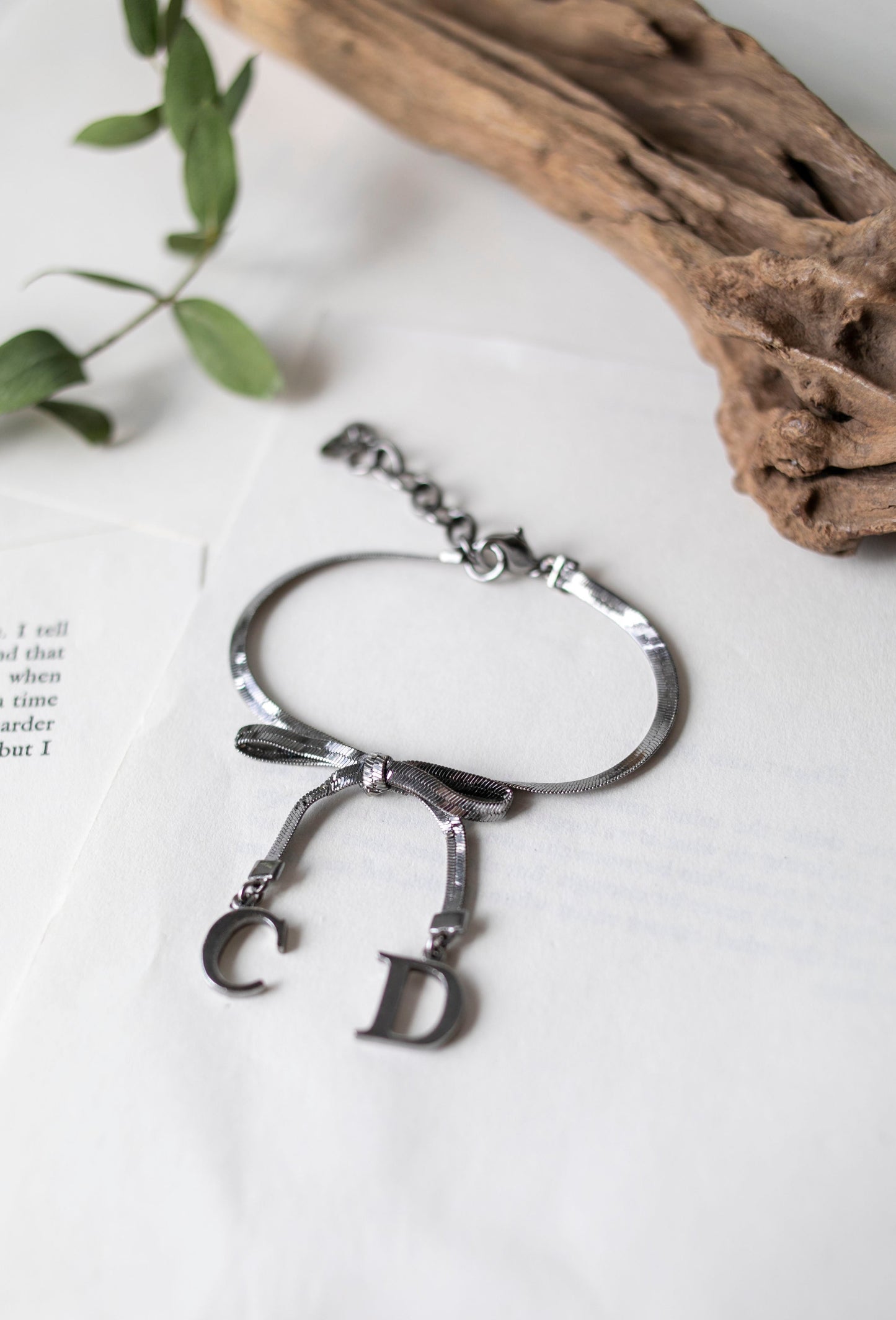 Vintage Jewelry: Silver Christian Dior CD Bow Bracelet J-CD01