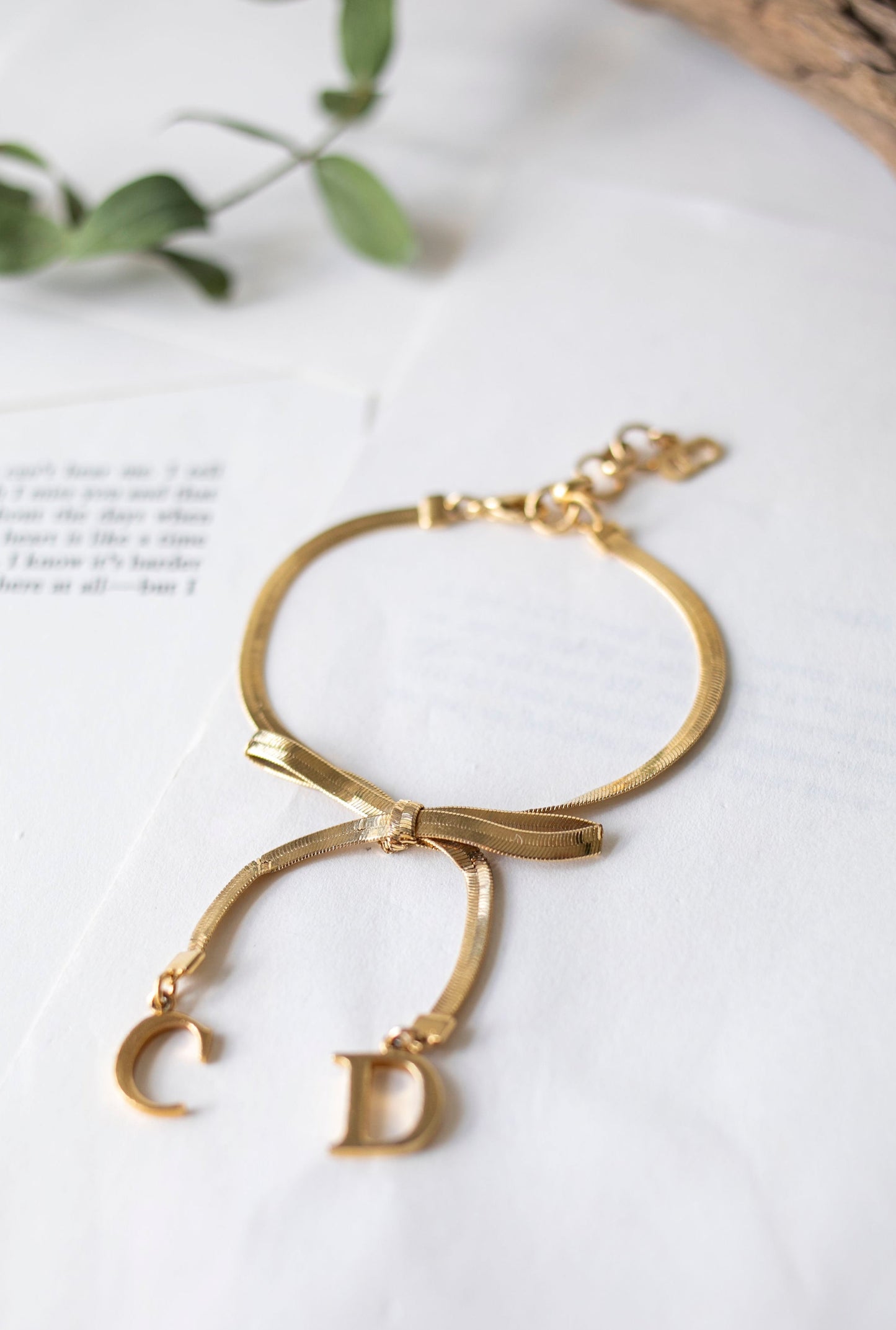 Vintage Jewelry: Gold Christian Dior CD Bow Bracelet J-CD01